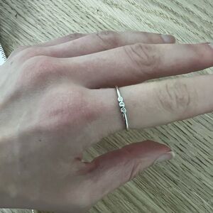 Tiny bezel diamond ring